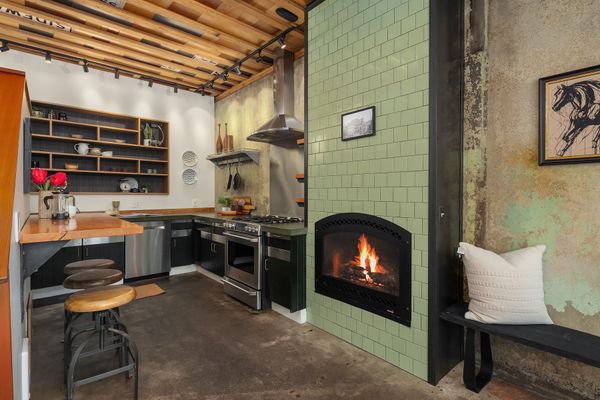 A functioning fireplace helps to heat the main living area.