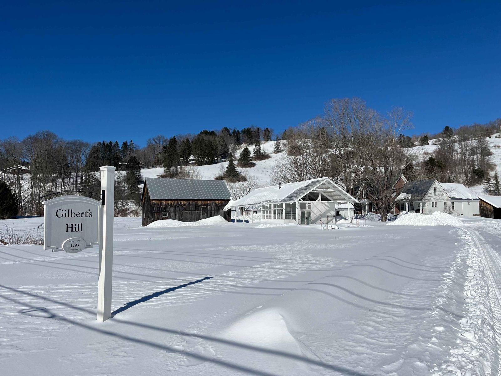 Gilbert’s Hill made history when it installed a rope tow in 1934—and the landmark Vermont property comes with five buildings and over 100 acres of conserved land. 