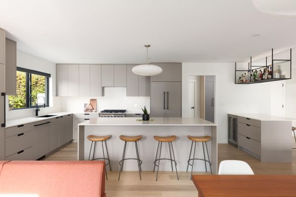 The kitchen features Fisher &amp; Paykel appliances and Caesarstone counters.