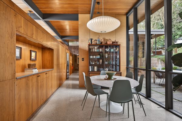 Designed in a U-shaped floor plan, the two wings extend into the backyard.