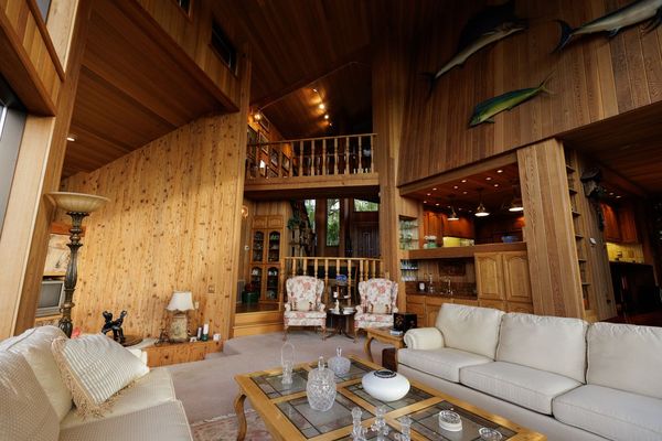 Throughout the home, wood clads the walls.