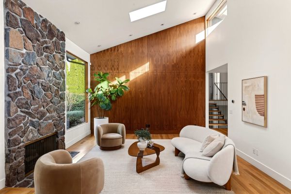 The slanted roofline reaches it's highest point above the living area, with a clearstory window and skylight letting in three-exposures of natural light.