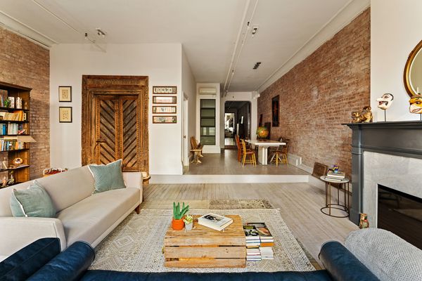 The living room is sunken one step, offsetting it from the rest of the home.