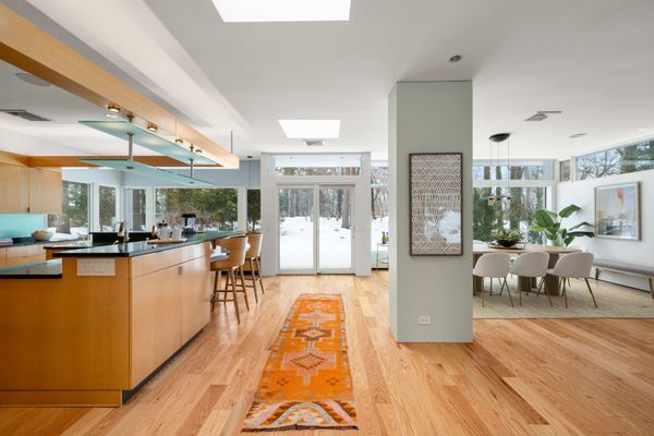 Skylights help to bring even more natural light to the kitchen and dining room.