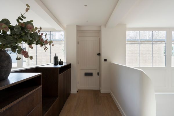 The street facing facade's multi-paned windows face south, drawing in ample natural light light.