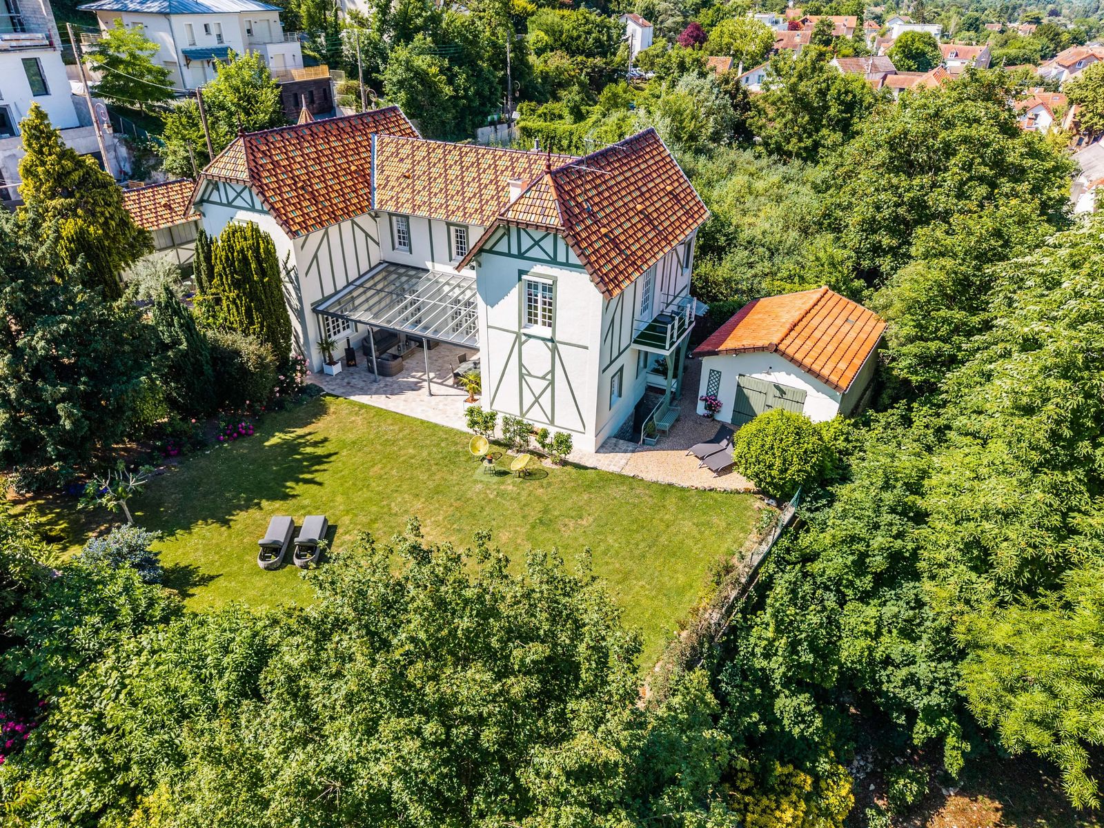 This belle époque property near Paris is over a century old, but it’s in pristine condition with an updated kitchen, a wine cellar, and chandeliers to spare.
