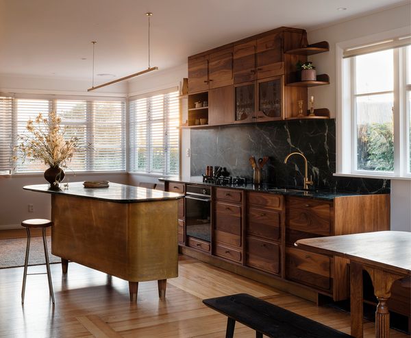 After: By reorganizing the layout rather than expanding it, the redesign allows the open-plan room to function the way it always seemed intended.