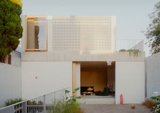 It’s Made From Glass Bricks, But Their Backyard Studio Is Anything But ’80s