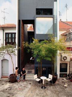 This historic home features a 25-foot door and large windows to represent a vastness of space, an idea that's both historic and modern. 
