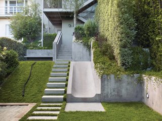 Rather than resist the natural slope of the Buena Vista Heights backyard, landscape architect Eric Blasen composed a well-considered, minimal, multiterraced space.