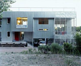 Thanks to passive solar and radiant floors, the metal-clad home is comfortable year-round.