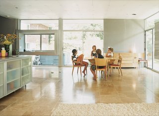The Boling children gather in the home’s open-plan living and dining area.