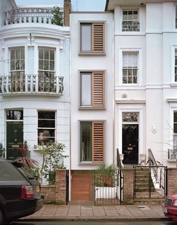 On an eight-foot-wide site in London, architect Luke Tozer cleverly squeezed in <br><br>a four-story home equipped with rain-water-harvesting and geothermal systems.