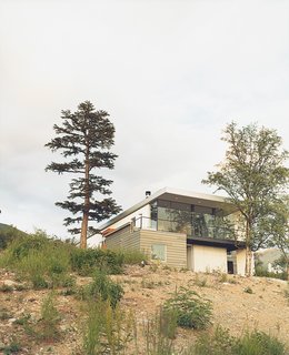 Though the Cook Inlet is nearby, from the street, the house’s simple facade gives little indication of the sights that await a visitor.