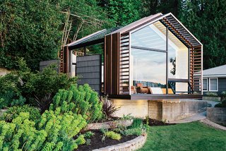 A vacation home’s renovated garage fuses art and architecture. When Bill and Ruth True bought a second home, overlooking the shores of Puget Sound on picturesque Vashon Island, it came with a compact, detached wood garage-cum-toolshed which they transformed with remarkable results.