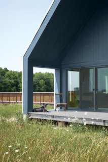 A Sustainably Built Home in Rural Ontario - Photo 2 of 16 - Doors and triple-glazed casement windows from Loewen work hard to form a tight thermal envelope.