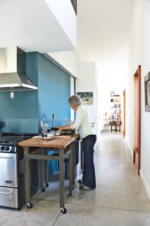 A Sustainably Built Home in Rural Ontario - Photo 6 of 16 - Though small, Treanor’s house feels spacious thanks to an open kitchen and a tranquil mezzanine.