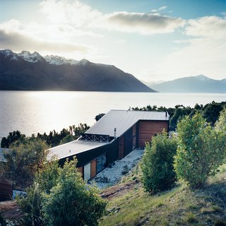 Nature Nurtured - Photo 6 of 11 - The home is made up of two parts: a rear wing containing the studio and a guest room, and the north-facing living quarters (which, in the southern hemisphere, attract the most sun) overlooking the lake.