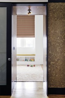 A Crash Course on Cork: The Eco-Friendly Material That's Popping Up Everywhere - Photo 7 of 8 - Wrapping the walls and ceiling of a children's bedroom with cork ensures a level of sound isolation from the rest of the house.