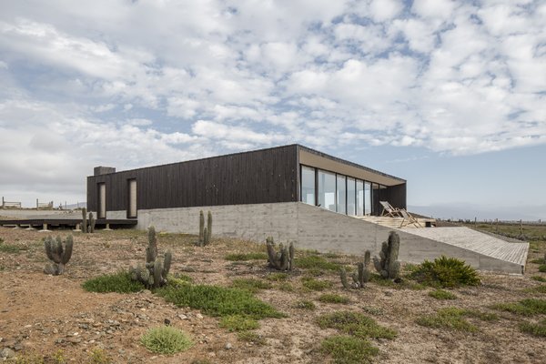 Pine was used for the exterior siding and the lower perimeter base is lined in reinforced concrete.
