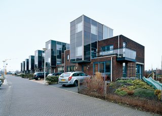 Run by the Sun - Photo 1 of 3 - Arranged and slotted together like a tidy row of Legos, the IJsselstein housing project reflects typical Dutch efficiency, "not just in terms of materials used," notes architect Gregory Kiss, "but in terms of space as well."