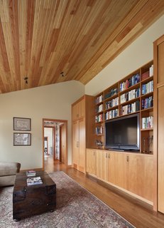 The second floor den, outfitted for the homeowners’ 12 grandchildren, serves as a versatile and cozy gathering place for the entire family.