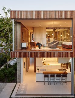 The house that Fleetwood Fernandez Architects designed for contractor Mehran Taslimi and his wife, Laila, embraces its surroundings. "They wanted doors that they could just throw open," designer Hunter Fleetwood says of the retractable wall system from Vitrocsa.