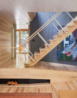 On the first floor, a gentle ramp ensures accessibility to common areas; all passageways are at least three feet wide. "Our goal was to accommodate a wheelchair without having the house feel designed differently at all," says principal Lisa Gray. The builder on the project, Scotty McClelland, has known and worked closely with the families for many years.