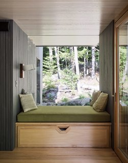 The house features Bayerwald sliding windows and highly insulated fixed glass; low-VOC paint from Benjamin Moore; and big overhangs to the south to shield summer sun and allow winter light. It was important to the family to integrate sustainable materials and strategies.