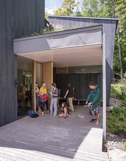 The two combined families return to the home each summer.