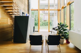 Custom details designed by Studiopietropoli include a sculptural fireplace/media center in the living room.