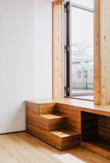 Inspired Indoor Teak Looks - Photo 2 of 14 - Stairs made of teak lead from the guest bedroom to the roof garden.