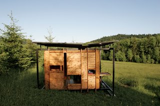 The prefab steel frame lightly touches the wood to prevent mold and mildew.