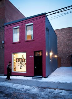 The facade was outfitted with a commercial-grade storefront window.