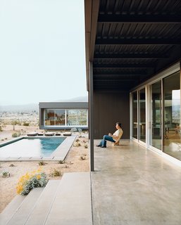 Composed of primarily steel, this prefab home has sufficient outdoor space. Photo by: Daniel Hennessy
