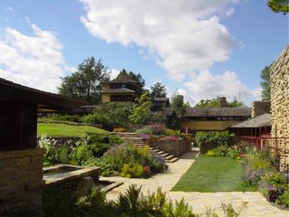 10 Frank Lloyd Wright Buildings We Love - Photo 7 of 10 - Taliesin (1911, Spring Green, Wisconsin). Wright's home and studio, rebuilt after two fires, is a peaceful retreat that demonstrates the architect's graceful merging of architecture and landscape.