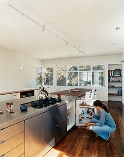 Neither the owner, a self-declared "card-carrying-modernist," or his girlfriend, Stephanie Kiriakopolos, miss having a big bulky refrigerator.