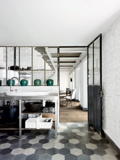 For the floors in the kitchen and throughout, Navone placed hexagonal Carocim tiles of her own design.