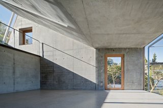 Camera-Inspired Artist's Studio Offers Stunning, Wide-Angle Views - Photo 7 of 7 - Finished this past fall, Camera Lucida lived up to Tonko's vision of a functional and earnest space for work and reflection. A staircase leads to a second level with additional workspace.