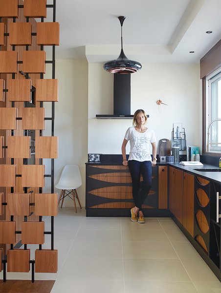 In the renovation of a 1950s building in Royan, France, interior designer Florence Deau selected a fleet of vintage and new furnishings.
