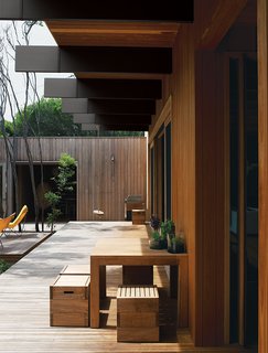 The courtyard deck is also made of tallowwood, a native eucalyptus. White mahogany—a dense timber that is termite resistant—clads the exterior. The sustainably sourced timbers are also fire resistant, a crucial feature in Australia in light of frequent drought and resulting forest fires.