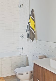 Duravit’s D-Code fixtures outfit the bathroom.