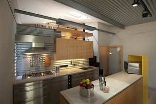 Compact Australian Home Clad in Steel and Concrete - Photo 3 of 10 -