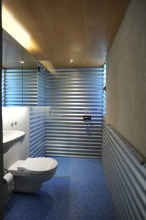 Compact Australian Home Clad in Steel and Concrete - Photo 7 of 10 -