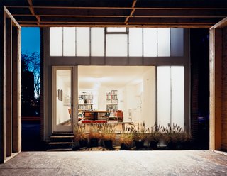 Now light emanates through the house’s rear window, and through polycarbonate panels concealing the upstairs bedroom.