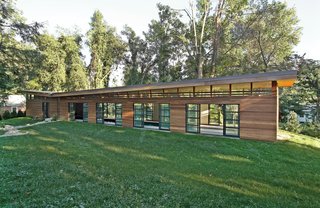 Though a stylistic break from the white-sided New England farmhouses that dot the forests and pastures of Western Massachusetts, the pool house’s simple, rustic exterior is a modern descendant of the local vernacular. With the area under snow for a quarter of the year, it also prevents Didier from having to join the local Polar Bear Club.