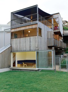 Pedigree Charted - Photo 1 of 10 - Coastal, on a hill, and made from inexpensive materials, the Ferguson house is a catalog of moving surfaces and open rooms.