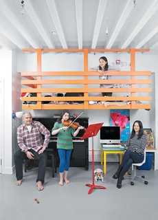 A Dine family portrait in front of the loft clubhouse Nick and Vanessa built for their daughters. As the girls get older, the playroom will transform into a family office.
