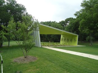 The pavilion sits in a clearing amid pecan, oak and mesquite trees. Photo by Architexas.