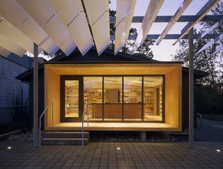 15 Modern Additions to Traditional Homes - Photo 14 of 15 - In Eugene, Oregon, the designer Ben Waechter transformed a small single-family house into a sales space for J-Tea International, adding an eye-catching canopy and a cedar porch to entice shoppers.